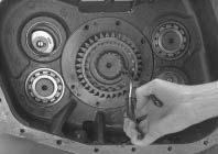 Transmission Overhaul Procedures-Bench Service 6. Apply Eaton Fuller thread sealant #71205 or equivalent to the capscrew threads, and install the six (6) capscrews.