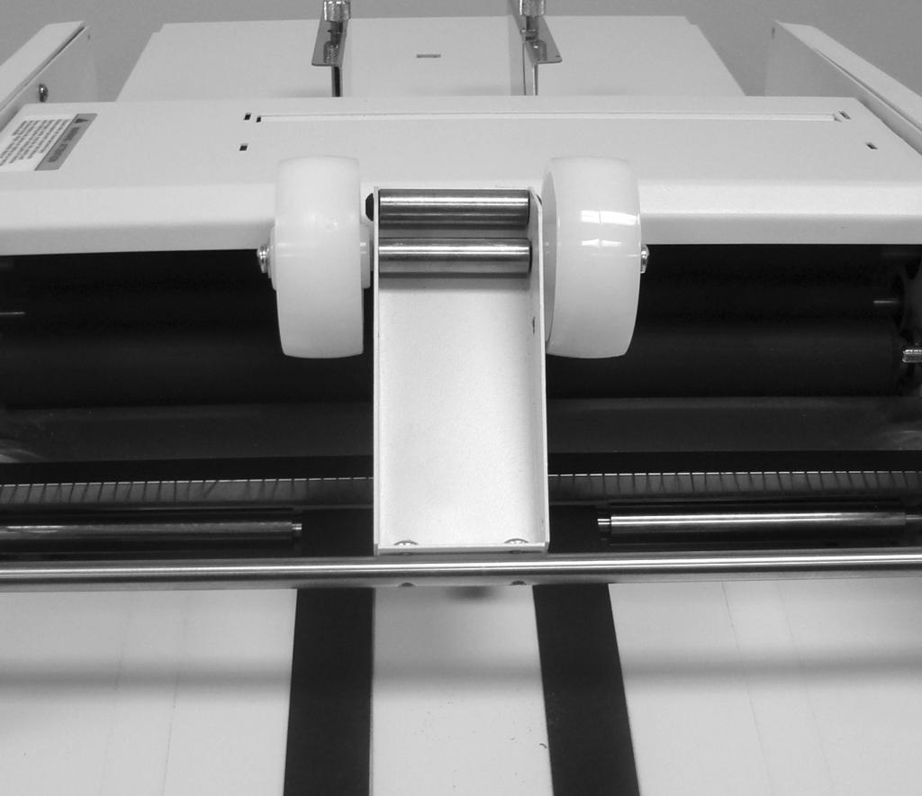 STACKER WHEEL SETUP FOR THICK PAPER Thicker paper from 28 # up to 65 # may require special stacker wheel setup