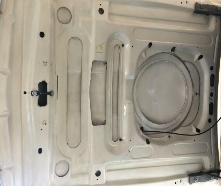 Because of the size and design of the hood locks this area had to be changed from a circular cut out to an oval cut out for clearance.