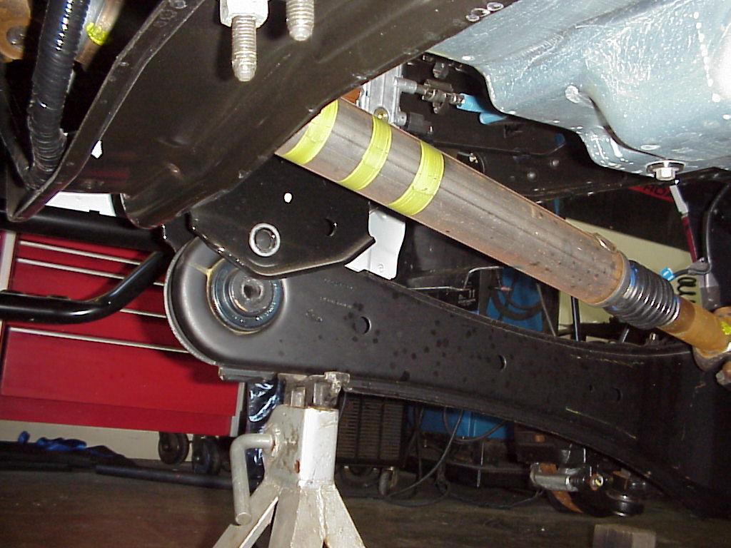 12. reinstall the pan rod bar into the new bracket you may have to jack the axle up or down