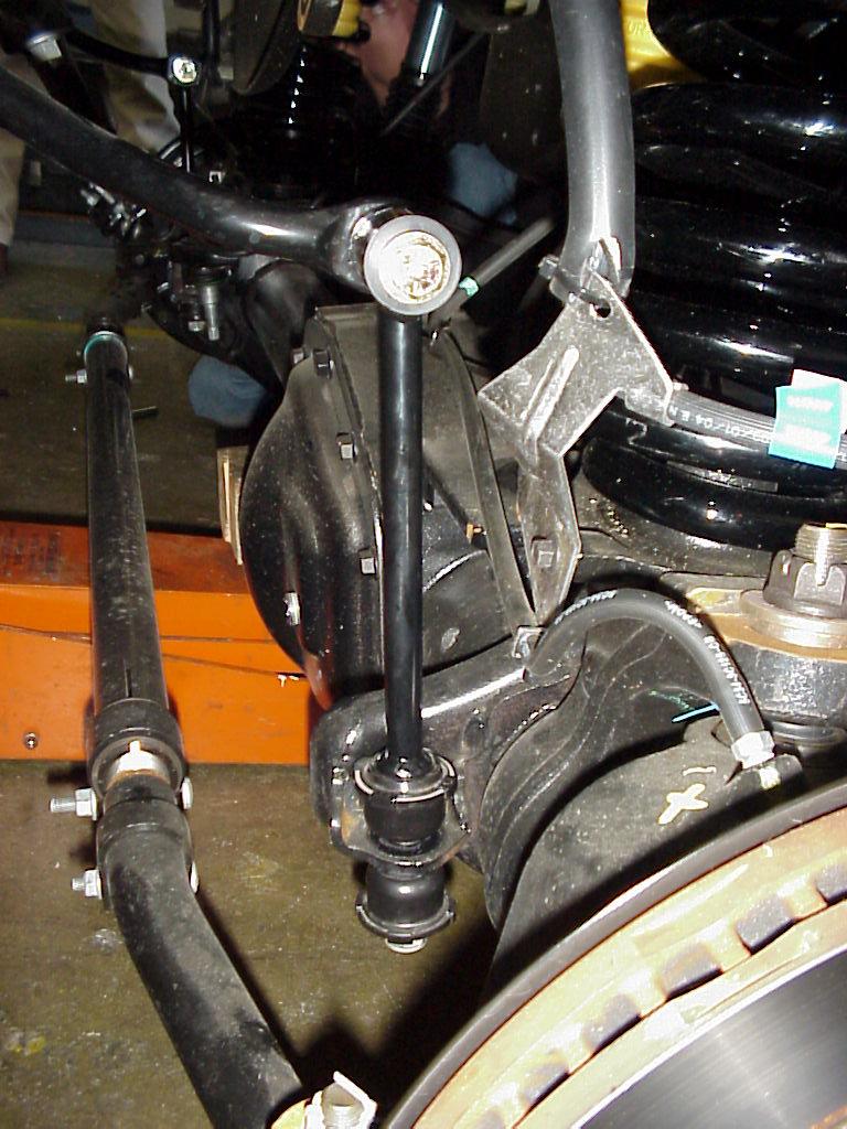 19. Installing sway bar links: Grease the bushings and install in the eyelet end of the new link. Grease the sleeve and install in bushings. Install the factory lower stem bushings on the new link.