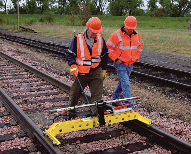 Gauge Restraint Reader Makes FRA-mandated inspection of yard tracks easier. At a comfortable walking pace, one worker can verify no-load track gauge, then stop at intervals to apply 4000 lbs.