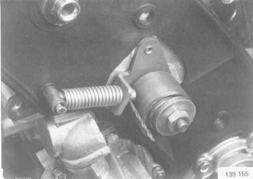 The pistons may strike the valves if the crankshaft or camshaft are rotated when the timing gear belt is removed. Remove the camshaft belt.