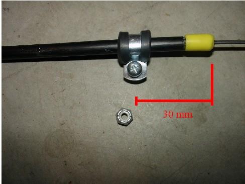 Use the nut and bolt to secure bracket to housing.