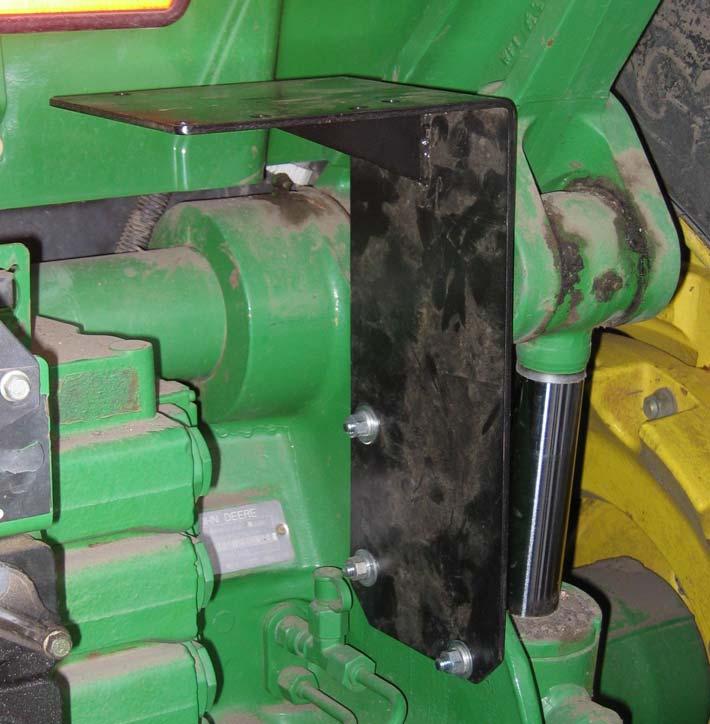 Mounting the Valve Bracket behind the Tractor Valve Bracket JD-8000 Secure the