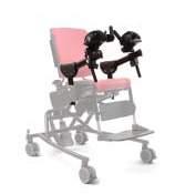 sits with her classmates in the cafeteria in her R850 hi/lo base Activity Chair.