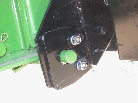 e) Tighten the header adjustment plate nuts.