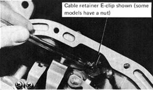 Remove the clip or nut that holds the cable adapter to the manual lever of the valve body. This will disconnect the cable from the valve body. (See Fig. 3.) FIGURE 1 B.