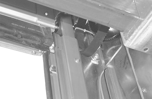 ) Drive Belt and Guide Pulley System A drive belt used to raise and lower the door can now be installed in each side column. 1.