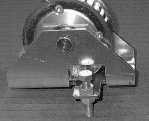 INSTALLATION BRAKE RELEASE 4. Secure the pulley bracket to the base plate using only the back post. Position that end of the pulley as close to the base plate as possible.