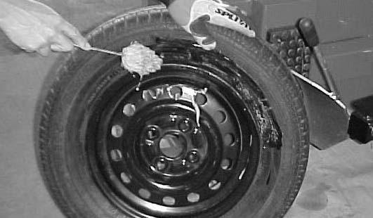 Deflate the tire by removing the valve core. Allow ALL AIR TO ESCAPE. DO NOT try breaking the bead until the air has completely deflated from tire. ( See Fig. 1 ) 4.
