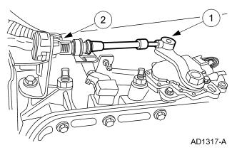 Page 2 of 5 8. Remove the rear driveshaft. 1. Remove the four bolts. 2. Remove the driveshaft. 9. Remove the starter motor. For additional information, refer to Section 303-06. 10.