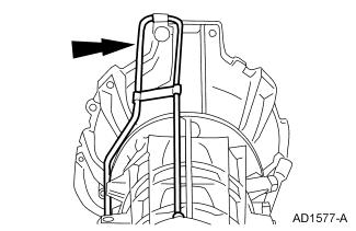Page 5 of 5 22. WARNING: Secure the transmission to the transmission jack with a safety chain. Failure to follow these instructions may result in personal injury. Lower the transmission. 23.