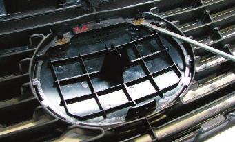 the upper grille) that retain the factory chrome molding to the bumper