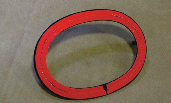 250 double faced tape to the front of the adaptive cruise emblem mounting plate