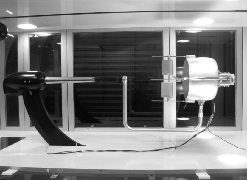 Design Improvement of a Versatile Ducted-Fan UAV Figure 4: Mounting of the Ducted-fan UAV in the Wind-tunnel Test Section Force and moment coefficients presented in this work have all been corrected
