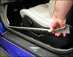 Fully open the soft-top using the power switch. 2. Leave the storage lid in the open position (straight up). Figure 1 3.