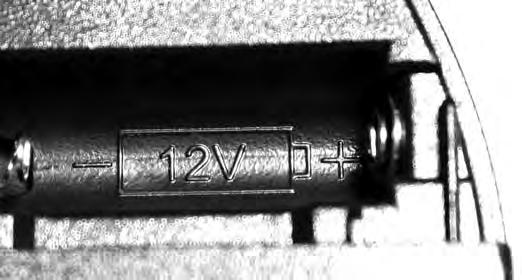Make sure new battery is facing proper direction (Match battery polarity with symbols inside battery housing) (Fig. 8-2).