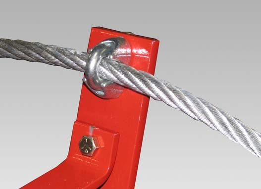 Install one / cable clamp on each side bridging bracket (both sides). Do not tighten the / cable clamps at this time.