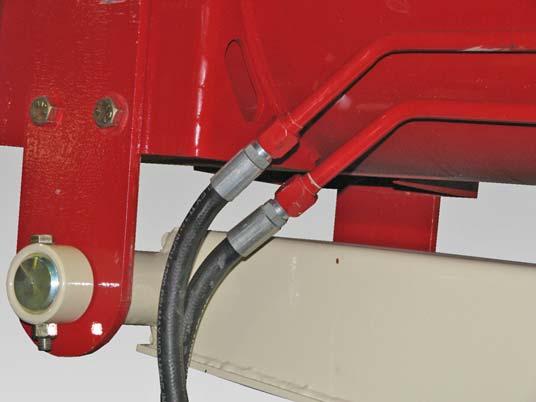 Install and tighten the based end hydraulic hose to the top hydraulic tube (Item ) [Figure 00].