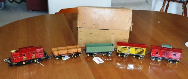 Both the 48-122 sets have the brown lumber car which usually only shows up in 1928 sets. 1929 cataloged sets always came with the green lumber car.
