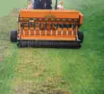 com Slit Seeding The optional Slit Seeder Attachment guides seed into open soil slits.