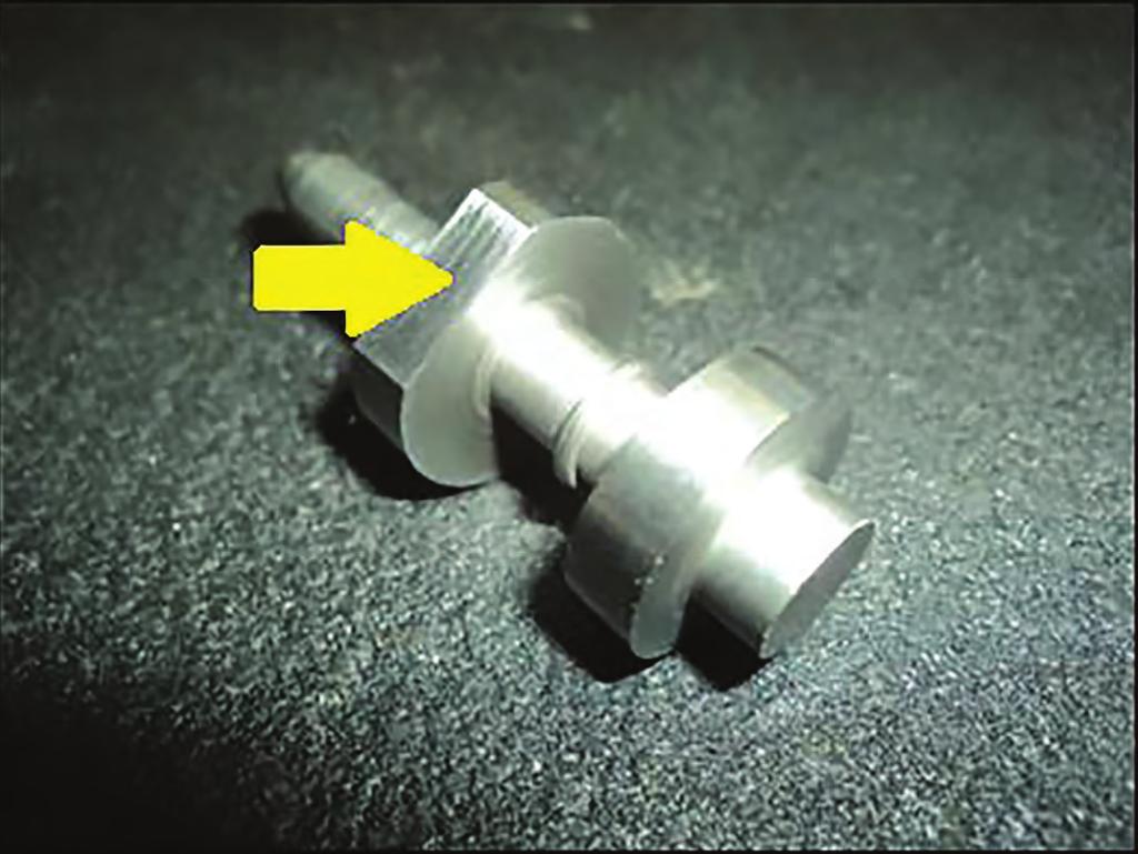 Locate the reverse boost land on the reverse boost valve (228); that s the larger of the two lands.