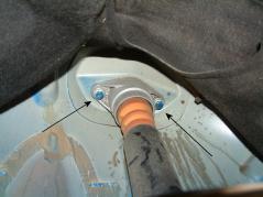 8 Remove fender liner retaining screws around damper to access upper