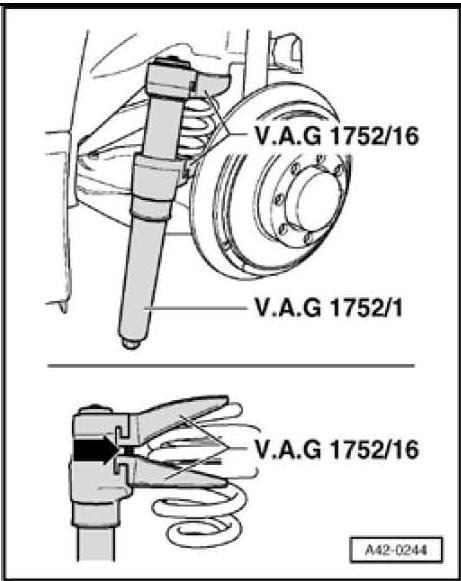 6 Insert spring tensioner VAG 1752/1 with spring holder VAG 1752/16 in coil spring.