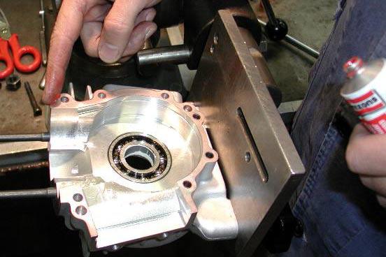 6 ONCE THE CORRECT PLAY IS ACHIEVED, DISASSEMBLE THE CRANKCASE AND APPLY FLUID GASKET