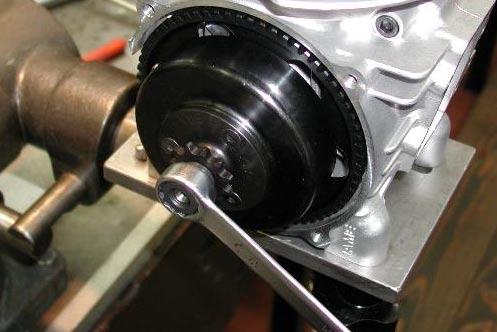 -REMOVE 10mm NUT (see Fig.4) -REMOVE OUTER WASHER, ROLLER CAGE, CLUTCH DRUM AND INNER WASHER.
