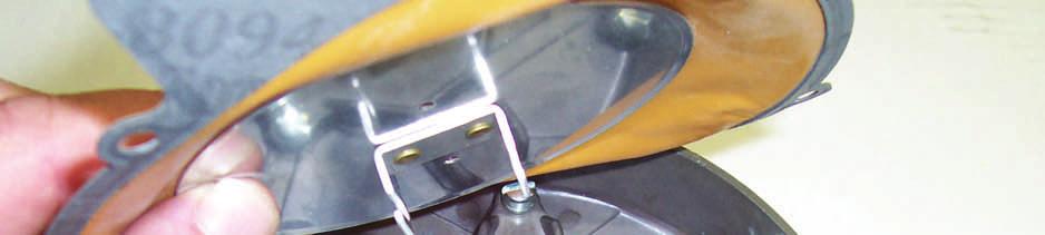 Slip spring under secondary lever