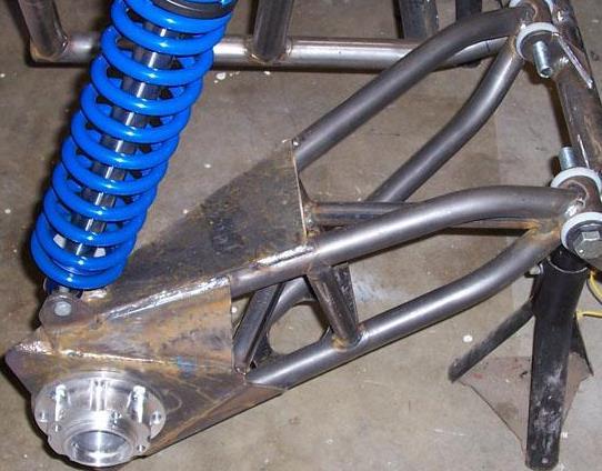 axles for drive. The semi-trailing arm design has the advantage of being durable and strong while also being very simple to design in a desired amount of travel and static camber.