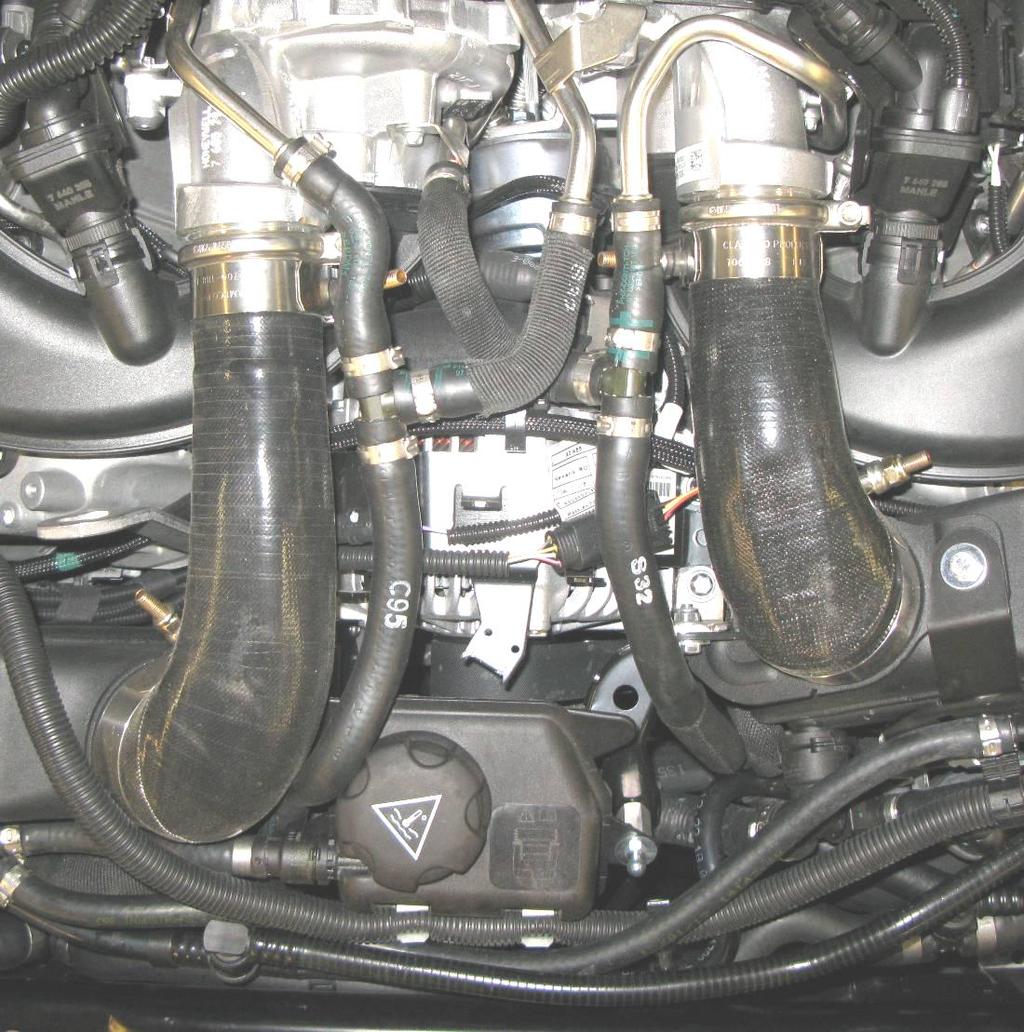 17. Install the Dinan hoses as shown in figure 26.