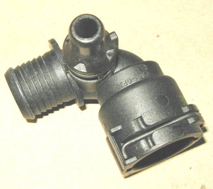 Remove plastic hose fitting as shown in figure 10.