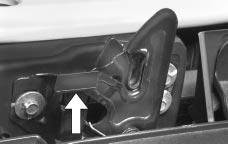 2. Then go to the front of the vehicle and release the secondary hood release. 3. Lift the hood; release the hood prop from its retainer and put the hood prop into the slot in the hood.