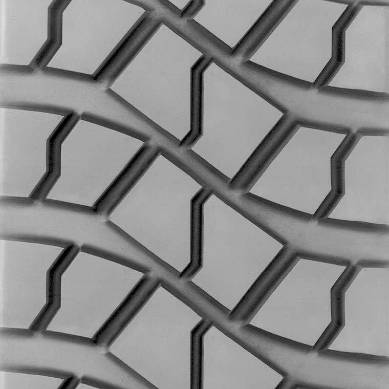 WIDE BASE LUG MegaMile Wide Base Lug is a drive axle retread with deep tread depth for use in on and off road applications including concrete mixers and front-end loaders.