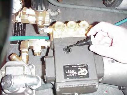 90 DAYS (COMMON) Drain oil in the water pressure pump by removing the