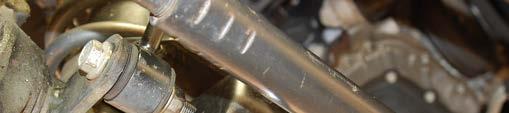 Using a 21mm socket remove the tie rod end from the