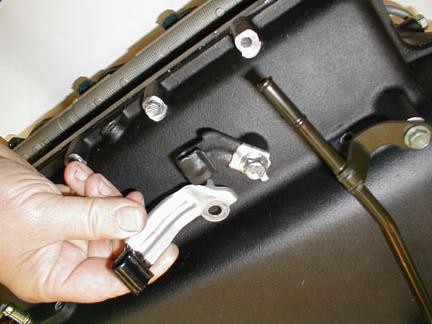 On Tundra and Sequoia, install the OE throttle cable support bracket (rrow, Figure 33) onto the TRD supercharger manifold using