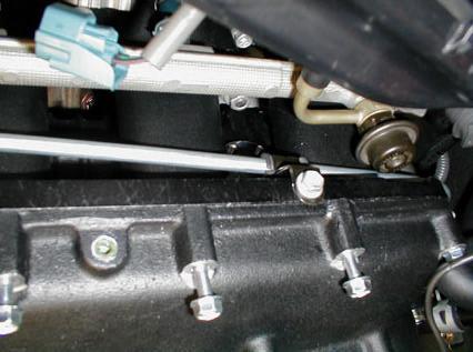 Use the OE 6mm fuel pipe bolt to secure the 9 th injector fuel line bracket to the mounting hole on the driver-side of the TRD intake manifold (rrow, Figure 55).
