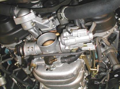 Remove and replace the fuel cap to relieve pressure from the fuel system. Figure 11 23.