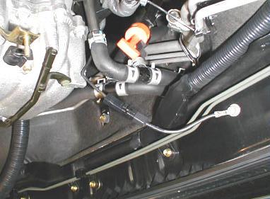 Do not remove the bolts that attach the top manifold to the bottom manifold. Remove the intake manifold.