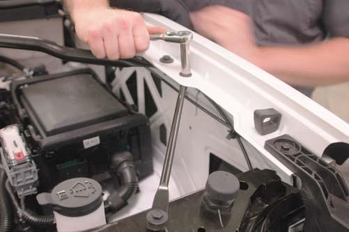 41. Remove the two upper-forward, diagonal fender-brace bars using a 10mm wrench. 42.