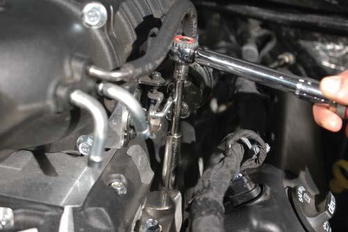 Apply blue Loctite 242 to the ten provided 75mm long supercharger mounting bolts.