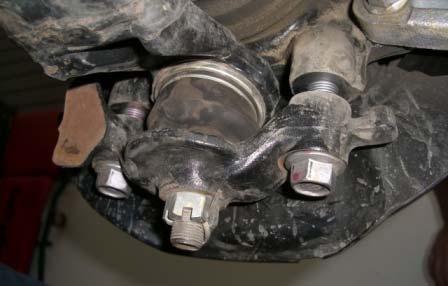 Remove the skid plate by unbolting the four 12mm bolts that hold it on. 2.