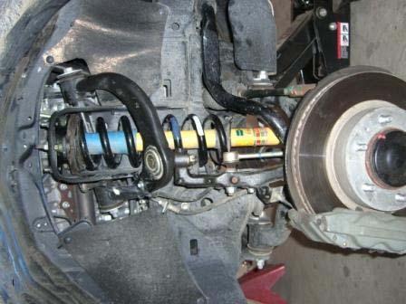 Installation Instructions 69-5212 6. Reinstall the strut assembly in its stock location.