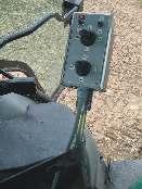 Emptying is controlled at the end of the field via the control panel in the tractor cab. A) Adjustment of sorting takes place via axial displacement of the centre roller.