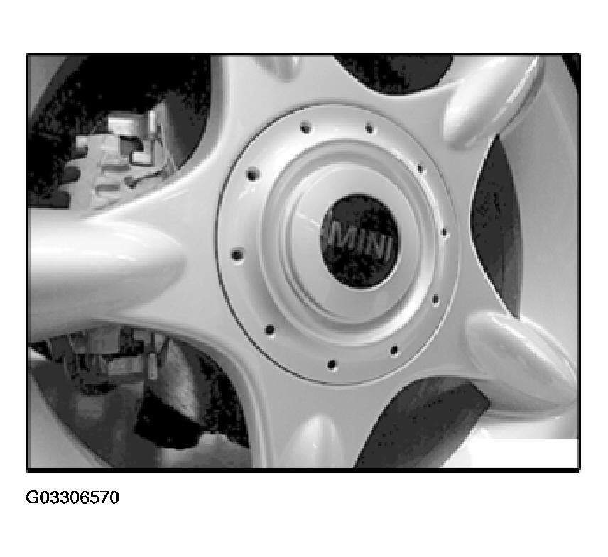 Fig. 33: View Of Aluminum Wheel Cover RDC TIRE CHECK SYSTEM 36 11 521 REMOVING AND INSTALLING/REPLACING RPA CONTROL UNIT (CARS UP TO 03/02) Necessary Preliminary
