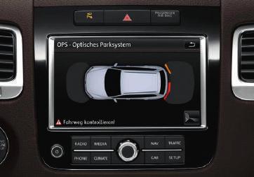 the vehicle that may otherwise be hidden from view. The viewing perspective is selected on the Infotainment system.